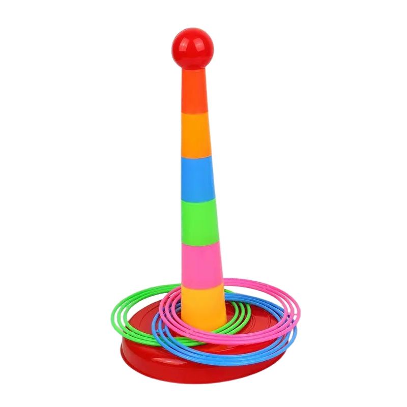 Colorful ring toss game tower with bright rainbow segments and multiple rings on a red base