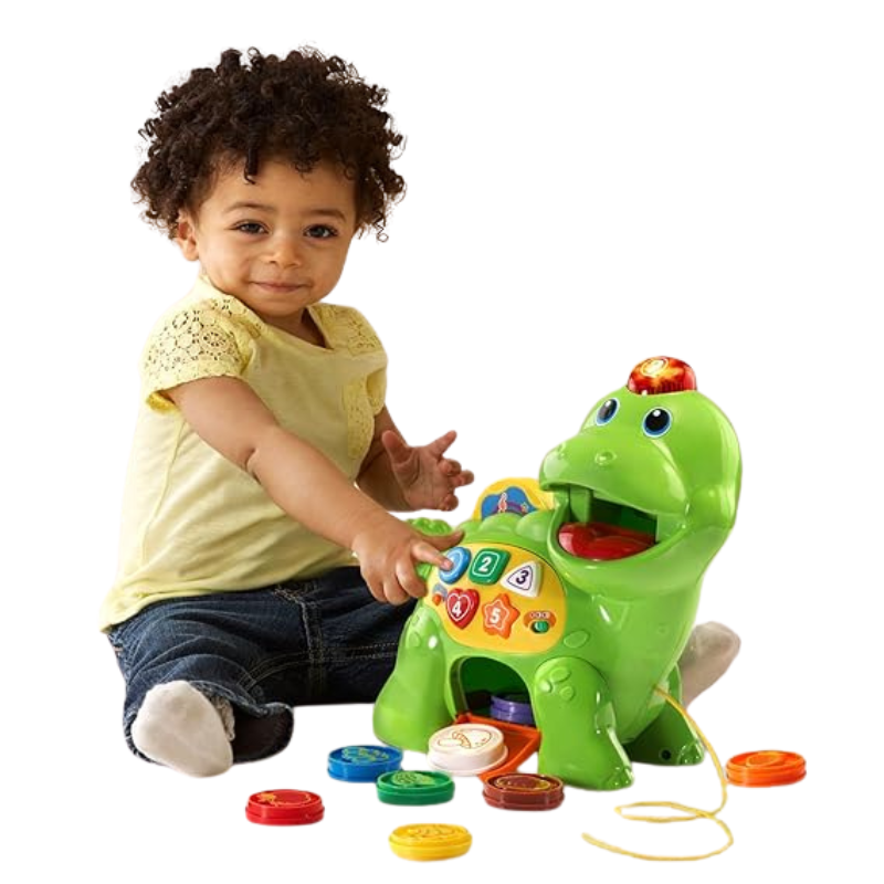 Toddler playing with the vibrant Chomp and Count Dino educational toy.